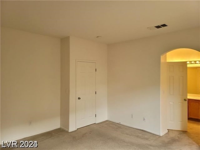 view of carpeted spare room