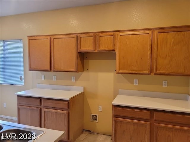 kitchen with light tile patterned floors