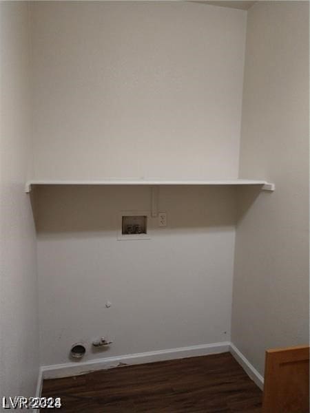 laundry area featuring washer hookup, dark hardwood / wood-style floors, and hookup for a gas dryer