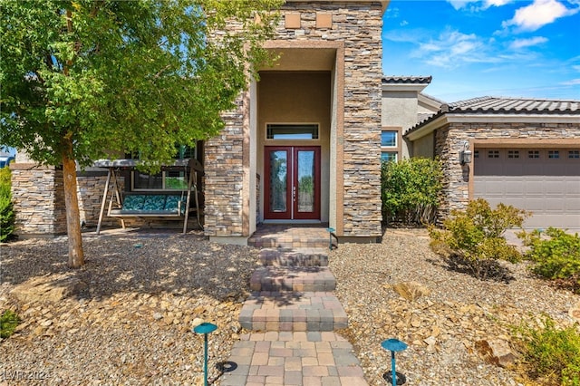 property entrance featuring a garage