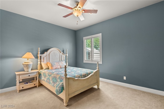 bedroom featuring ceiling fan and carpet floors