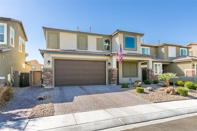 view of front of home with a garage