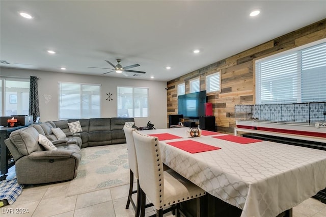 4323 Creekside Cavern Ave, North Las Vegas, NV 89084 - dining area featuring recessed lighting, a ceiling fan, wooden walls, and light tile patterned floors