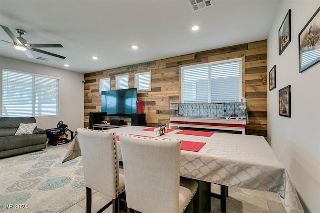 4323 Creekside Cavern Ave, North Las Vegas, NV 89084 - dining area with wood walls, recessed lighting, healthy amount of natural light, ceiling fan, and an accent wall