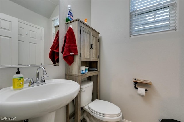 4323 Creekside Cavern Ave, North Las Vegas, NV 89084 - half bath with a sink, toilet, and baseboards