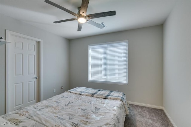 4323 Creekside Cavern Ave, North Las Vegas, NV 89084 - carpeted bedroom with baseboards and a ceiling fan