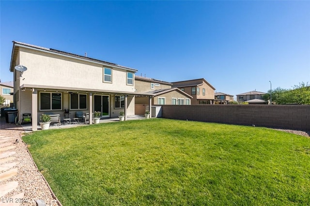 4323 Creekside Cavern Ave, North Las Vegas, NV 89084 - back of house featuring a patio and stucco siding