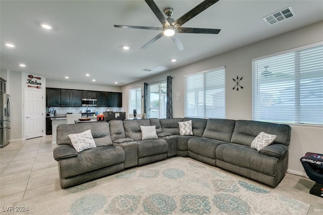 4323 Creekside Cavern Ave, North Las Vegas, NV 89084 - living area featuring recessed lighting, a ceiling fan, baseboards, and light tile patterned floors