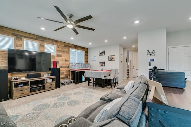 4323 Creekside Cavern Ave, North Las Vegas, NV 89084 - living area featuring wooden walls, a ceiling fan, and recessed lighting