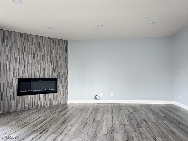 unfurnished living room featuring light wood-type flooring