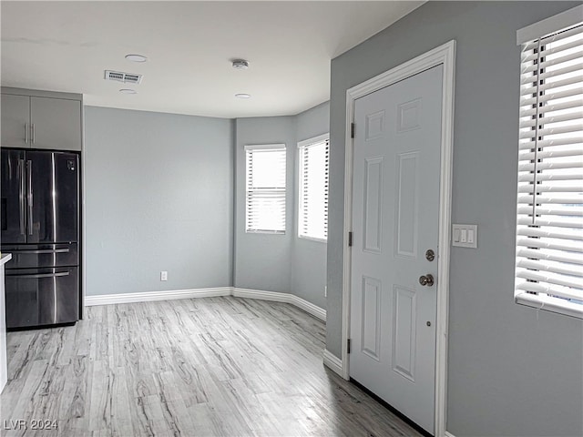 entrance foyer featuring light hardwood / wood-style floors