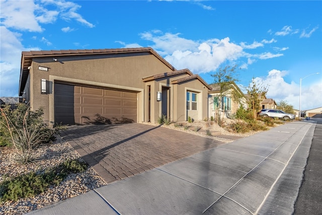 view of front of property with a garage