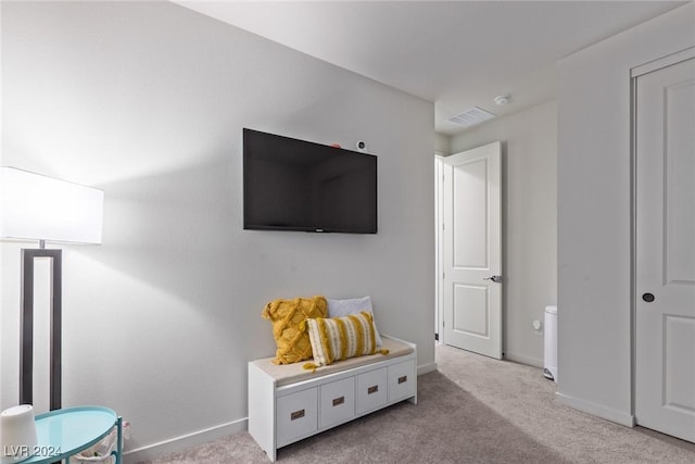 recreation room with carpet floors, baseboards, and visible vents