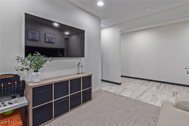 interior space featuring baseboards and visible vents