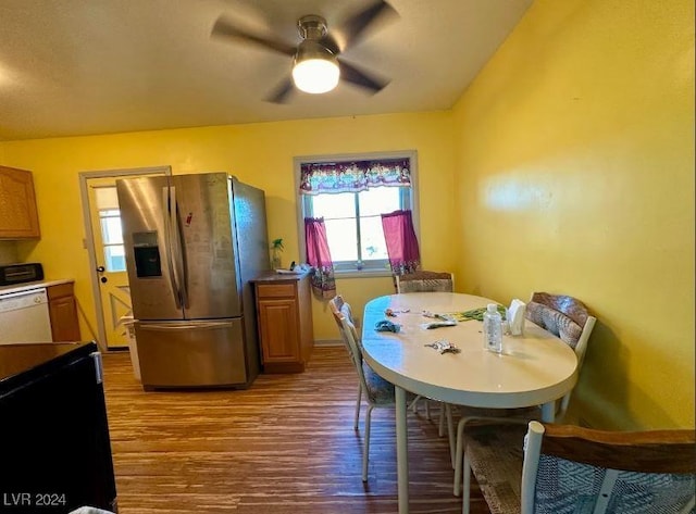 dining room featuring ceiling fan and wood-type flooring