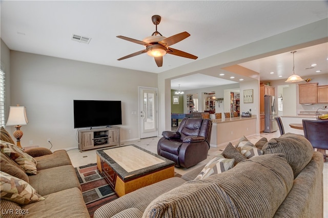 living room featuring ceiling fan