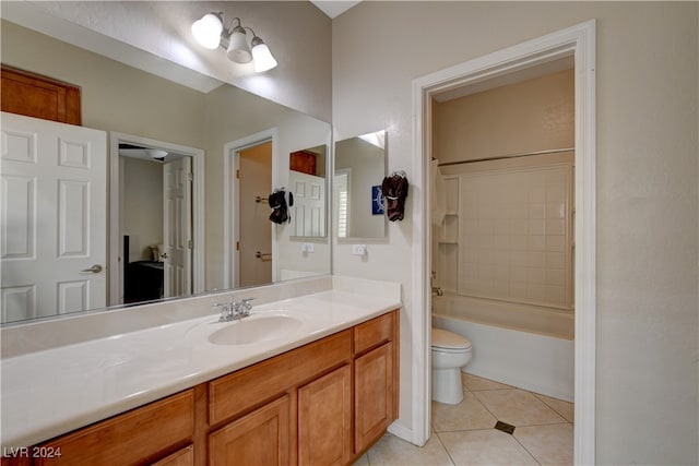 full bathroom featuring vanity, toilet,  shower combination, and tile patterned flooring