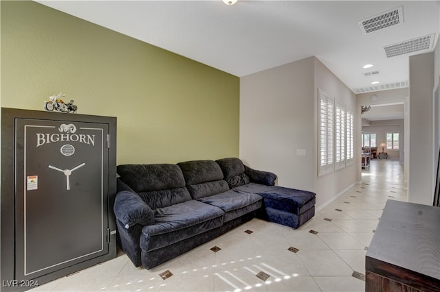 living room with tile patterned floors