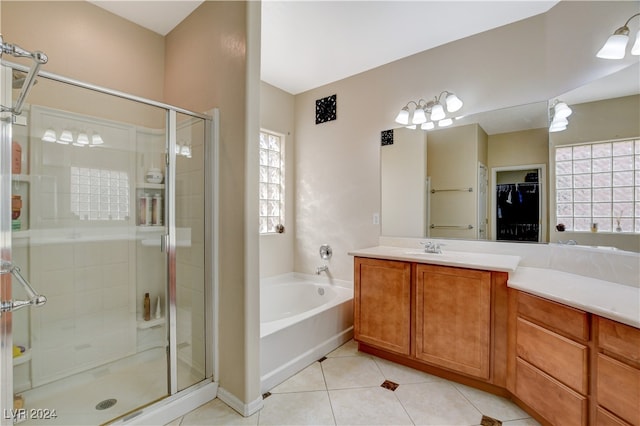 bathroom with vanity, plus walk in shower, and tile patterned floors