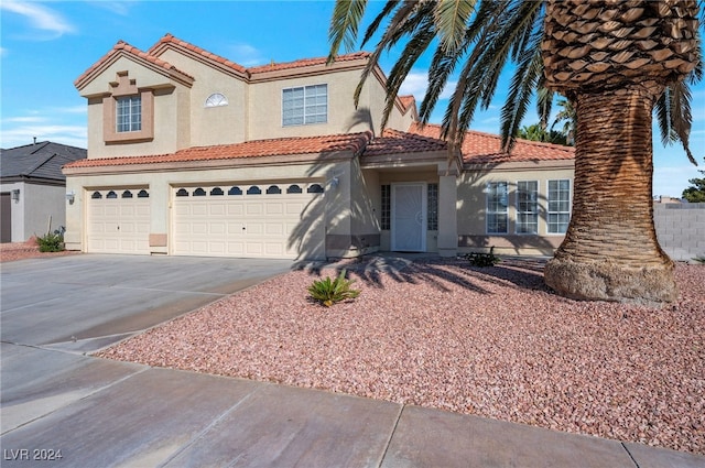 view of front of house with a garage