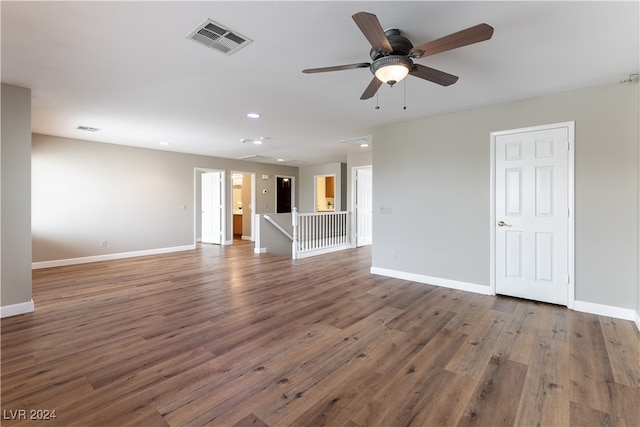 unfurnished living room featuring ceiling fan and wood-type flooring