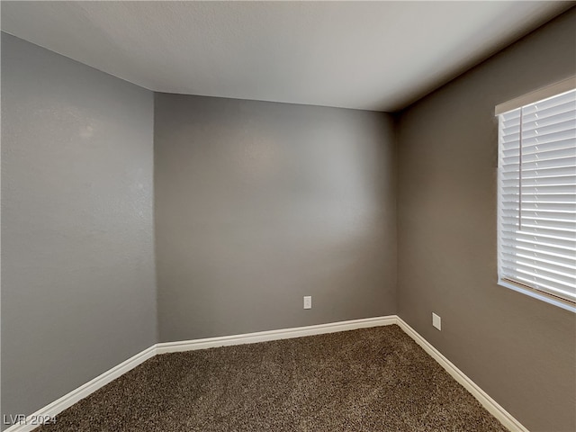 spare room with carpet flooring and a healthy amount of sunlight