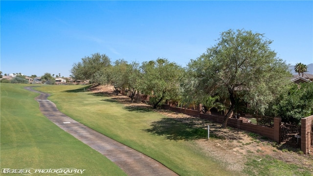 surrounding community featuring a yard