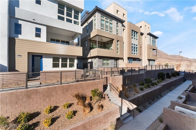 view of building exterior featuring a mountain view