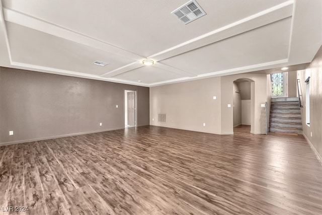 unfurnished living room with wood-type flooring