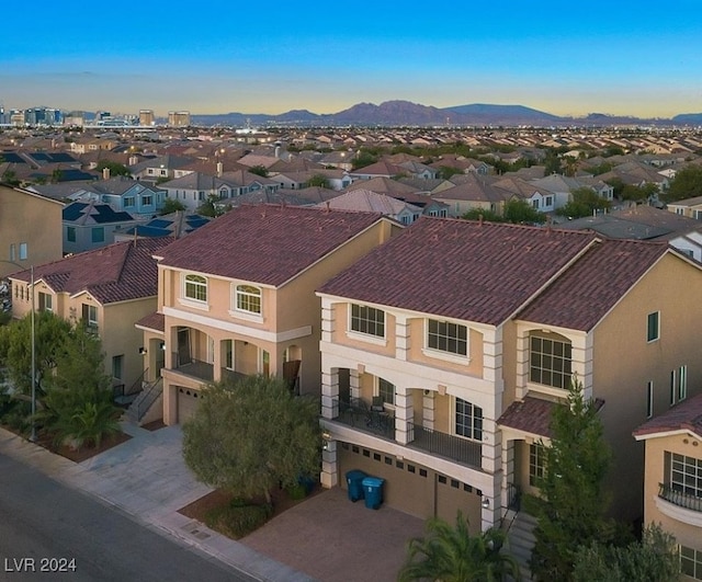 drone / aerial view featuring a mountain view