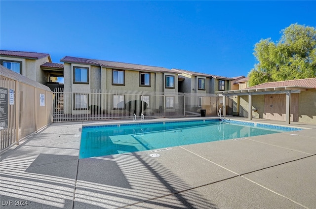 view of swimming pool featuring a patio