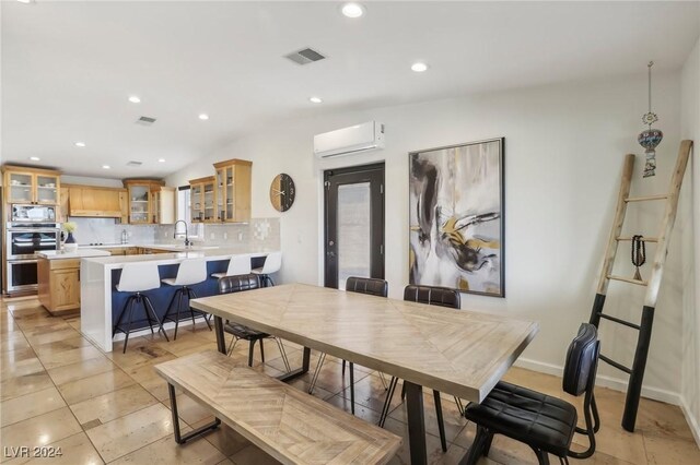 tiled dining space featuring a wall mounted AC and lofted ceiling