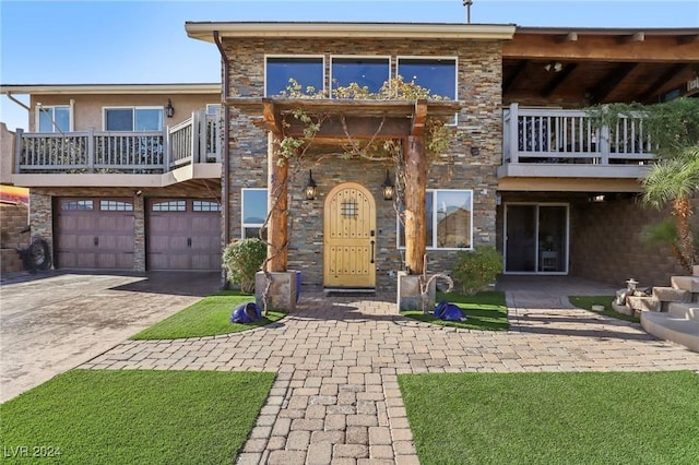 view of front of home with a garage