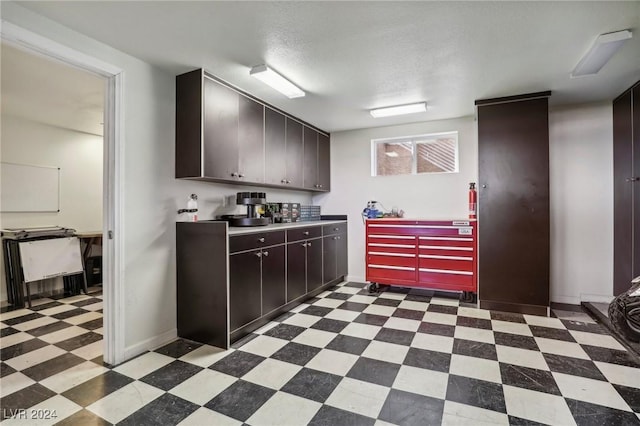 kitchen featuring a textured ceiling