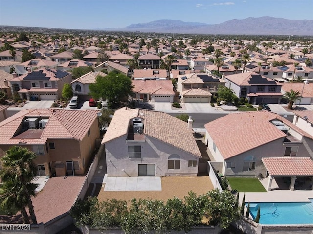 drone / aerial view featuring a mountain view