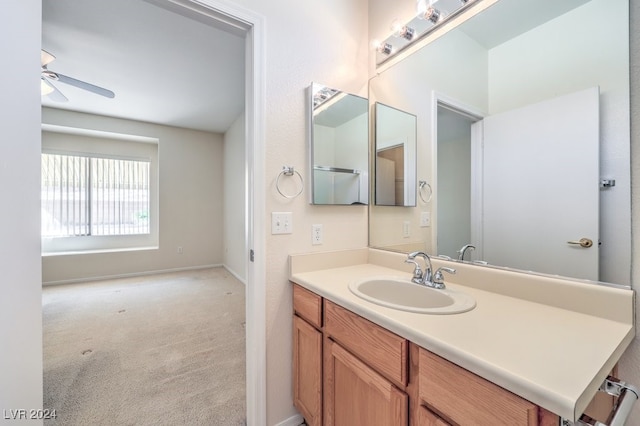 bathroom featuring vanity and ceiling fan