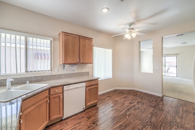 kitchen with white dishwasher, ceiling fan, dark hardwood / wood-style flooring, and sink