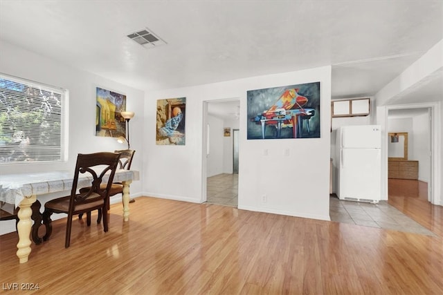 dining room featuring light hardwood / wood-style flooring