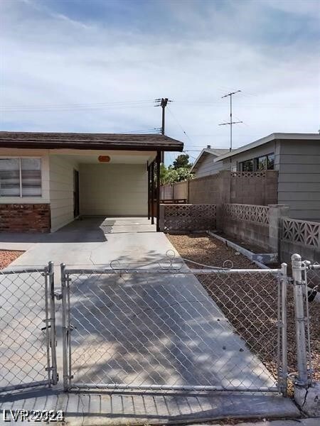 exterior space featuring a carport