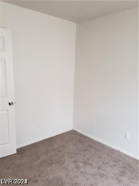 1929 Evelyn Ave, Henderson, NV 89011 - empty room featuring carpet and baseboards