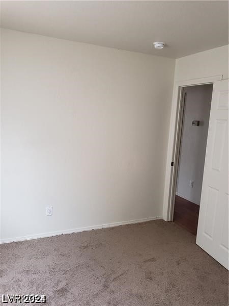 empty room with carpet floors