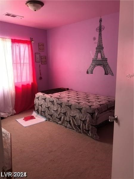 bedroom featuring carpet flooring