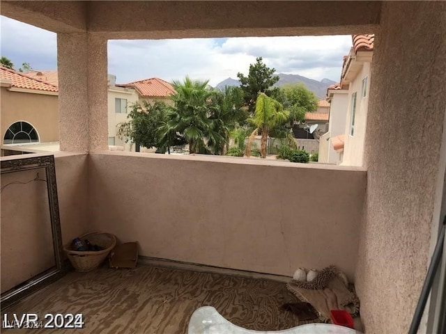 balcony featuring a mountain view