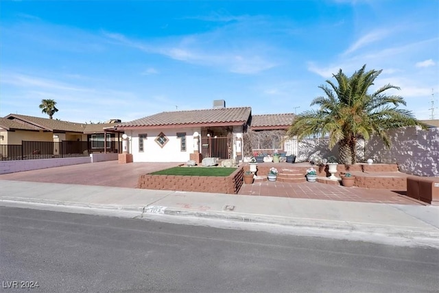 view of front of home with a patio