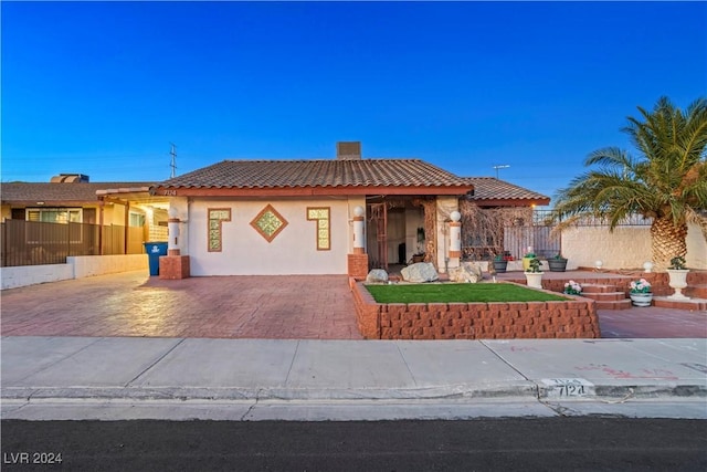 view of front of home with a patio area