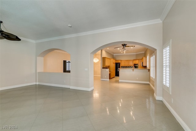 unfurnished living room with crown molding, light tile patterned flooring, and ceiling fan