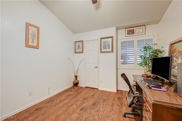 office area featuring lofted ceiling and light hardwood / wood-style flooring