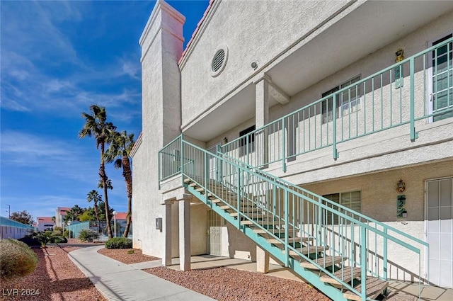 view of home's community with stairs