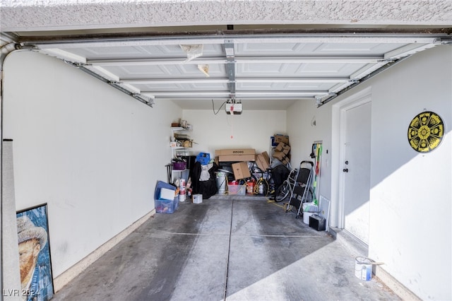 garage featuring a garage door opener