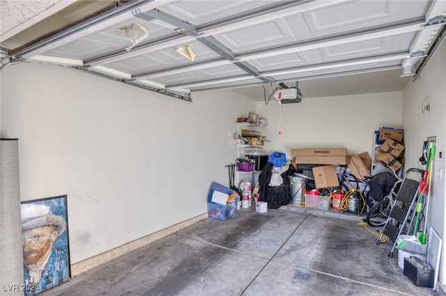 garage featuring a garage door opener